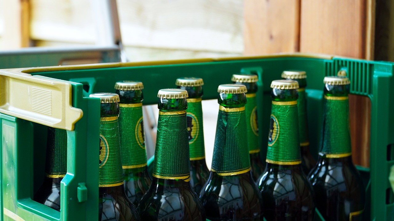 Beer bottles and cans in a crate